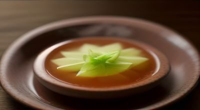 国产精品有机茶叶礼盒呈现，西湖龙井、云南普洱和武夷岩茶并排陈列，包装古朴典雅，茶香氛围浓郁
